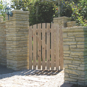 Wooden round top gate in garden